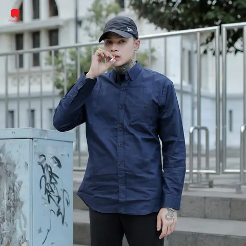Foto produk Kemeja Basic Polos Lengan Panjang Pria Kualitas Premium, kategori Kaos Rominsy Jeans